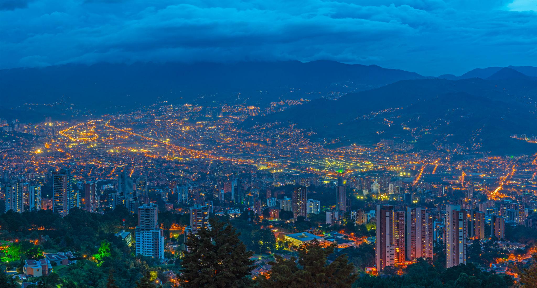 Medellín Colombia glowing skyline at night